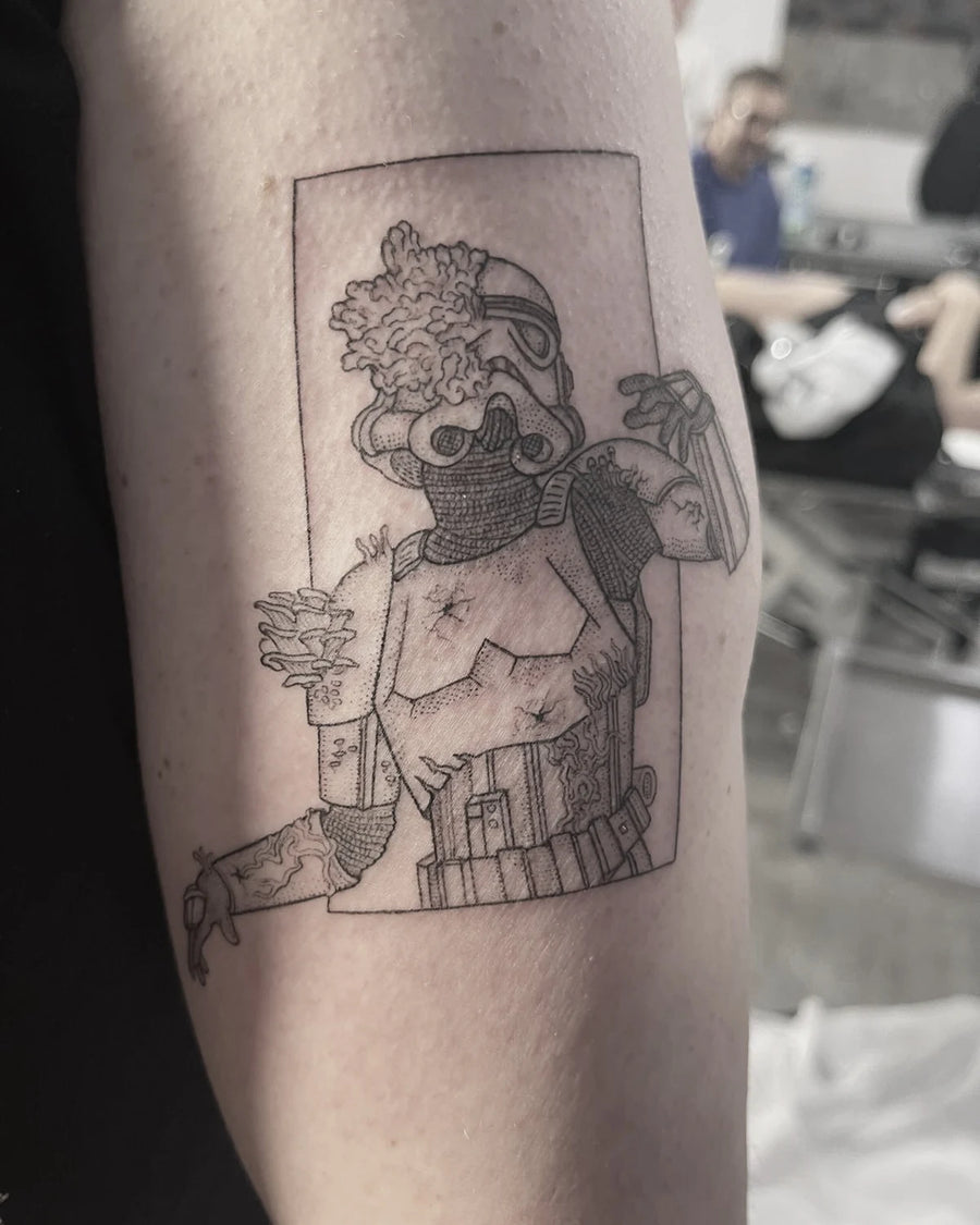 Infected Stormtrooper artwork tattooed on a leg