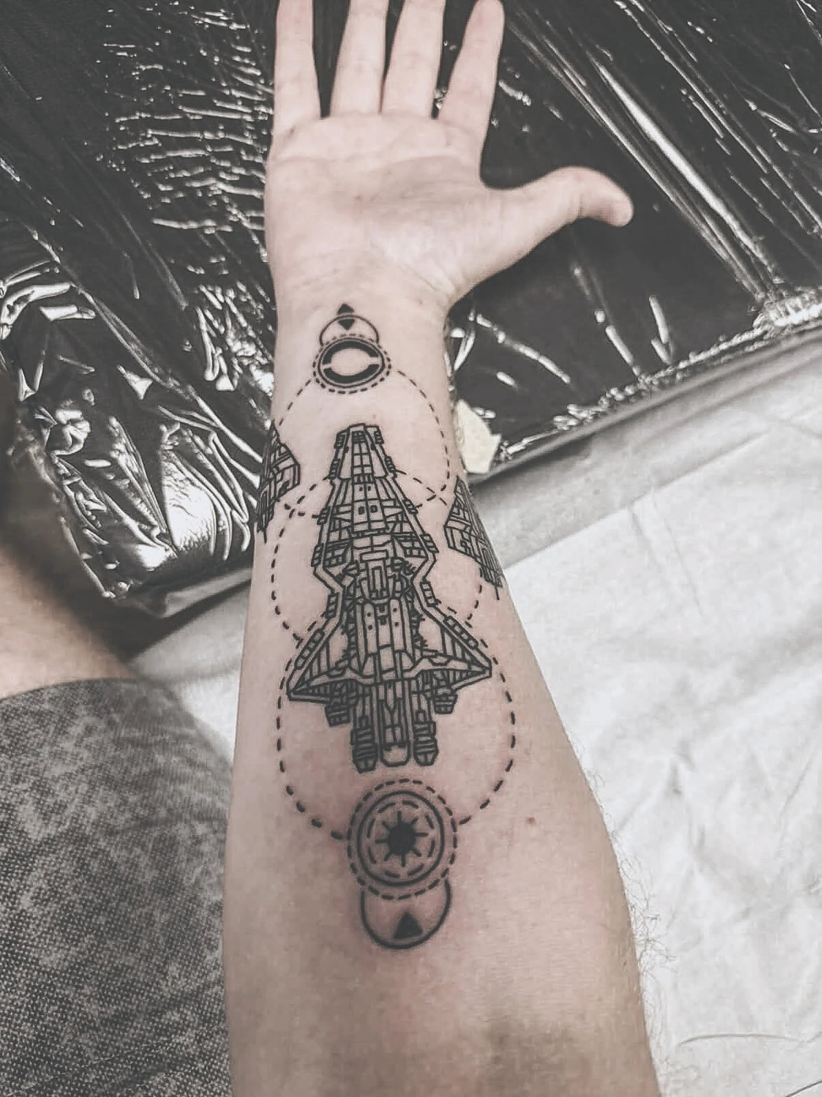 Geometric Venator tattoo artwork